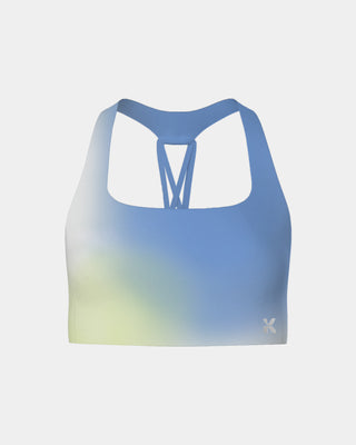 Supportive sports bra in a blue gradient, engineered for high-impact activities with moisture-wicking fabric and a secure fit.