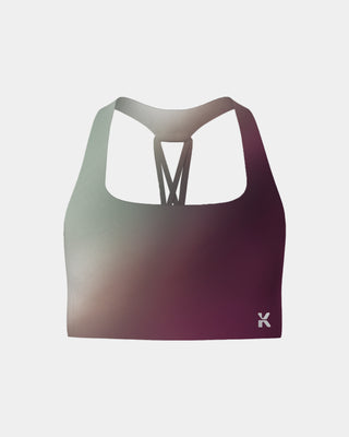 Supportive sports bra in a plum gradient, engineered for high-impact activities with moisture-wicking fabric and a secure fit.